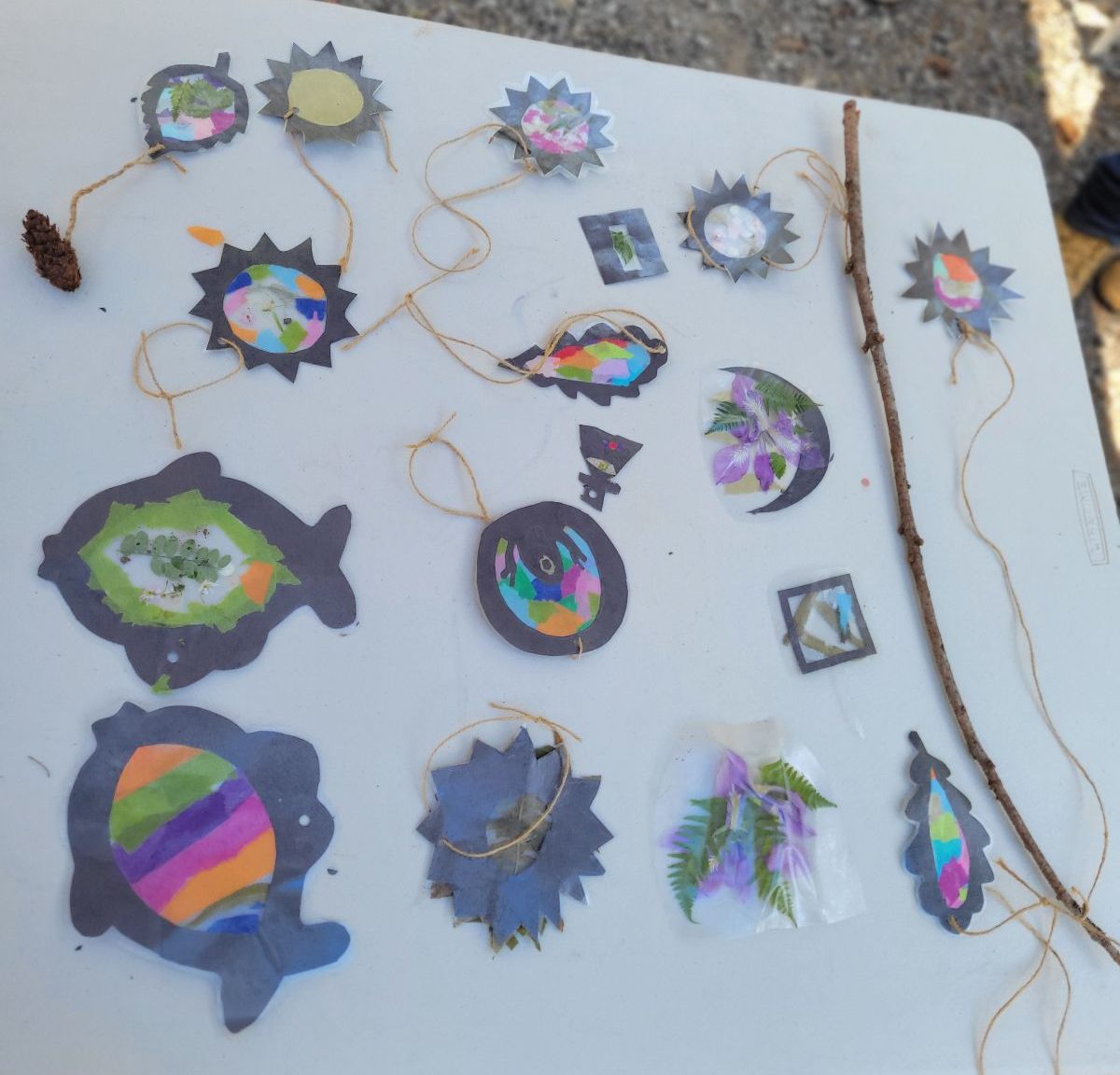 a display of sun catcher project made my Mobile Makerspace students